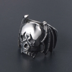 Vintage stainless steel bat skull ring featuring a punk gothic design on black background