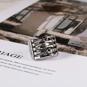 Gothic punk ghost hand ring in stainless steel with cross and skull bone design