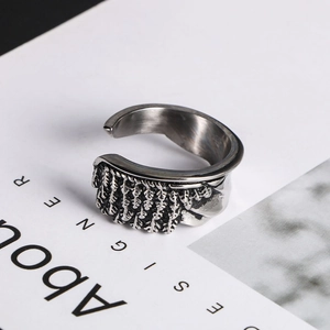 Detailed view of angel wing texture on retro silver titanium steel adjustable ring