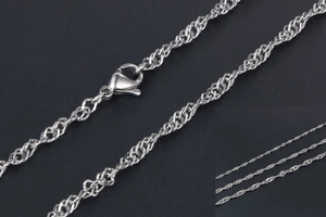 Detailed view of silver water wave chain with a sturdy lobster clasp closure