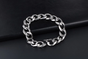 Detailed view of gothic snake pattern chain bracelet in vintage stainless steel