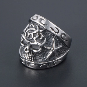 Gothic skull ring in vintage silver finish with star and scrollwork engravings