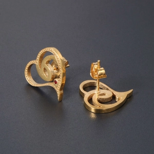 Gold-plated titanium steel double heart stud earrings with a tiny red crystal accent