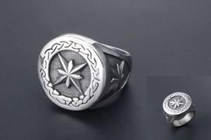 Macro shot of silver vintage octagonal star ring with matte brushed metal finish