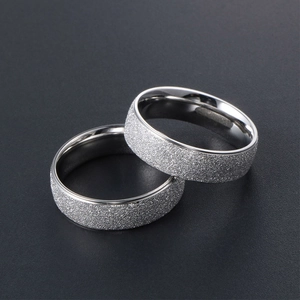 Minimalist silver titanium steel couple rings with frosted finish and polished inner bands
