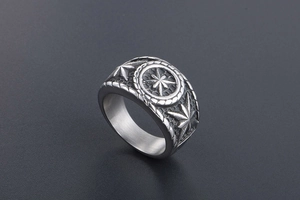Macro detail of retro octagonal star ring with vintage silver finish and punk style