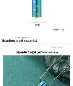 Macro detail of rainbow titanium steel cylinder pet urn pendant with paw print engraving