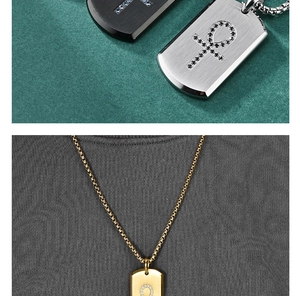 Detailed macro view of Ankh symbol pendant with inset stones in gold, silver, and black