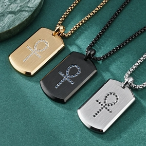 Three-color Ankh cross pendants in gold, black, and silver with cubic zirconia stones