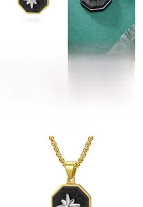 Detailed view of hexagonal titanium steel pendant with meteorite texture and star motif