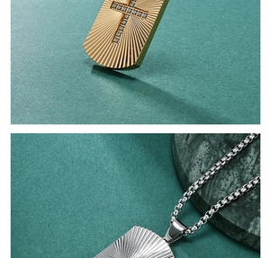 Detail of square cross pendant with sunburst texture and sparkling center stone