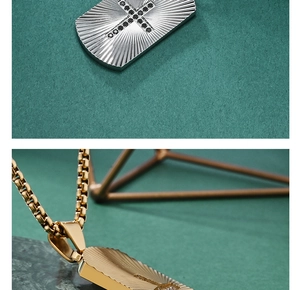 Close-up of CNC carved folding fan pattern military tag pendant with cross stone inlay