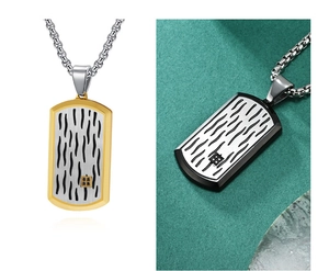 Detailed view of 3D wave pattern dog tag necklaces in gold and gunmetal finishes