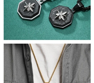 Detail of hexagonal star pendant with carbon fiber texture and stylish square link chain