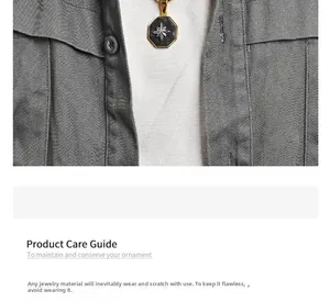 Detail of gold octagonal star pendant with black inlay on a minimalist necklace chain