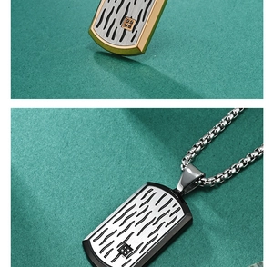Detailed macro view of ripple texture dog tag pendant with four micro-set black stones