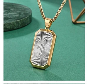 Detailed macro view of two-tone cross pendant with radial fan texture on stone base