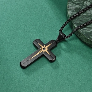 Collana croce in acciaio inossidabile nero con stella dorata e zircone su marmo verde