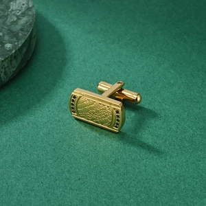 Golden rectangular cufflinks with world map texture and black zircon inlay
