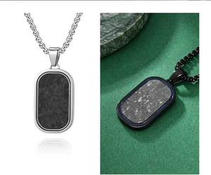 Detailed comparison of carbon fiber and marble oval pendants with durable link chains