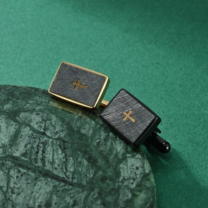 Polished stainless steel square cufflinks with gold cross and brushed gray panels