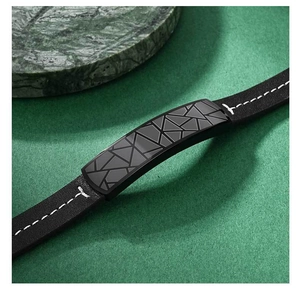 Detail of fiber leather bracelet featuring geometric triangle pattern on titanium steel plate