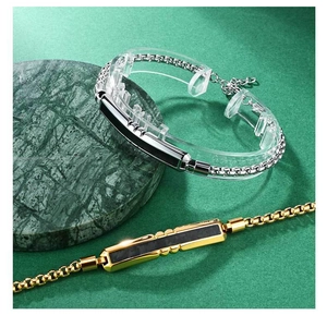 Close-up of men faceted carbon fiber bracelets in gold and silver finish with box chains
