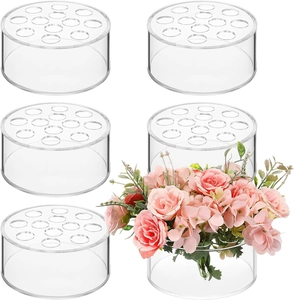 Macro view of clear acrylic 12-hole flower centerpieces showing high transparency