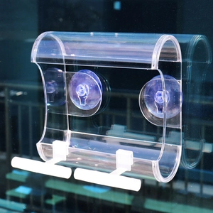 Clear acrylic window bird feeder with strong suction cups and two white perch stands