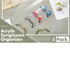 Five-pack of clear acrylic wall-mounted sunglasses organizers shown in a lifestyle setting