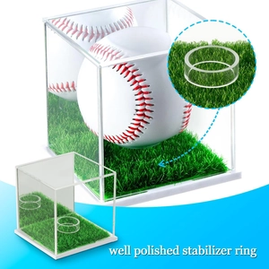 Detail of the polished stabilizer ring and green turf base on acrylic baseball case