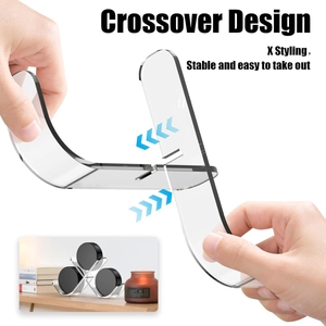 Transparent acrylic hockey puck display stand with a stable crossover X-styling design