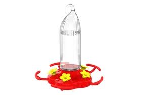 Close-up of hummingbird feeder featuring yellow flower ports and clear water reservoir