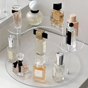 Detailed top view of a 3-tier acrylic tiered display stand for perfumes and cosmetics