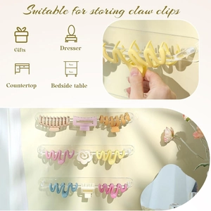 Clear acrylic wall-mounted display rack for organizing hair claw clips on various surfaces