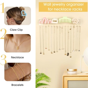 Wall-mounted acrylic jewelry organizer displaying hair clips and necklaces in a home setting