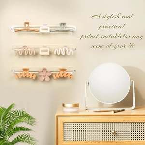 Clear acrylic wall-mounted headband and hair claw clip display rack for home organization
