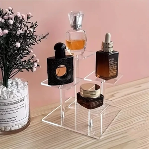 Transparent acrylic 4-tier riser stand for perfumes, cosmetics and figurines