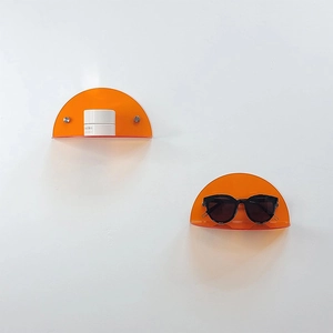 Set of 2 orange acrylic floating shelves for wall decor and cosmetic storage