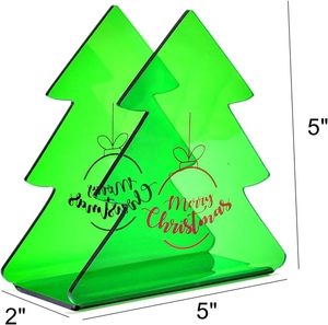 Green acrylic Christmas tree napkin holder with Merry Christmas text for holiday table decor