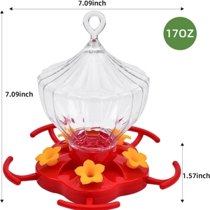 Pumpkin-style hanging hummingbird feeder with red base and 17oz clear reservoir