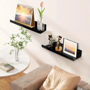 Set of two black acrylic floating shelves for modern wall-mounted home organization