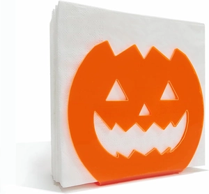 Orange pumpkin-shaped acrylic napkin holder with a festive Halloween jack-o'-lantern design