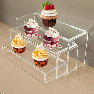 Set of 3 clear acrylic U-shaped risers for cupcake display and retail counter showcases