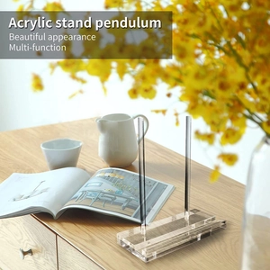 Minimalist clear acrylic display stand with dual pillars on a natural wooden tabletop