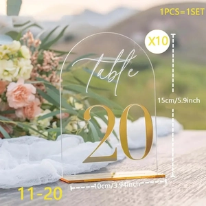 Close-up of 5x7 inch arched acrylic table numbers 11-20 with golden mirror bases