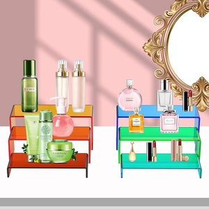 Rainbow acrylic riser stand set showing a stable U-shaped structure for cosmetic storage