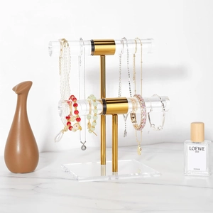 Two-tier gold metal and acrylic jewelry stand display for necklaces and bracelets