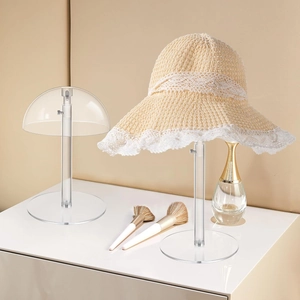 Adjustable acrylic hat stands for shop display featuring clear dome and round base