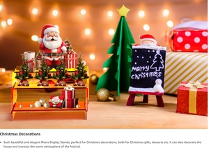 Three-tier orange acrylic riser stand displaying festive Christmas ornaments and small gifts
